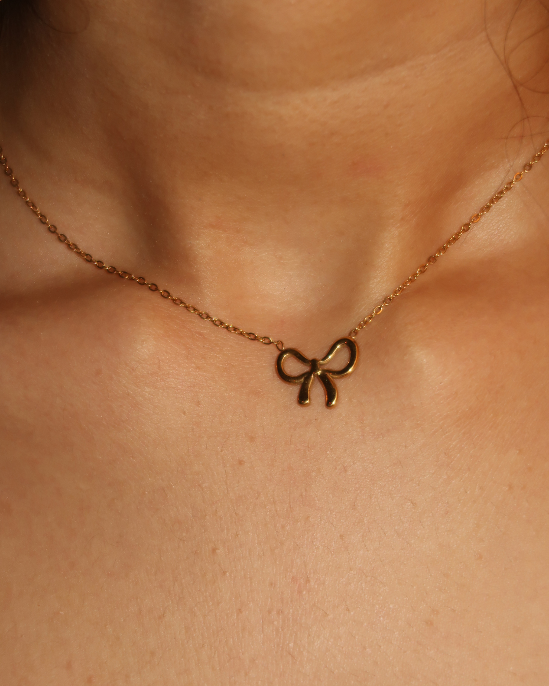 Bow pendant