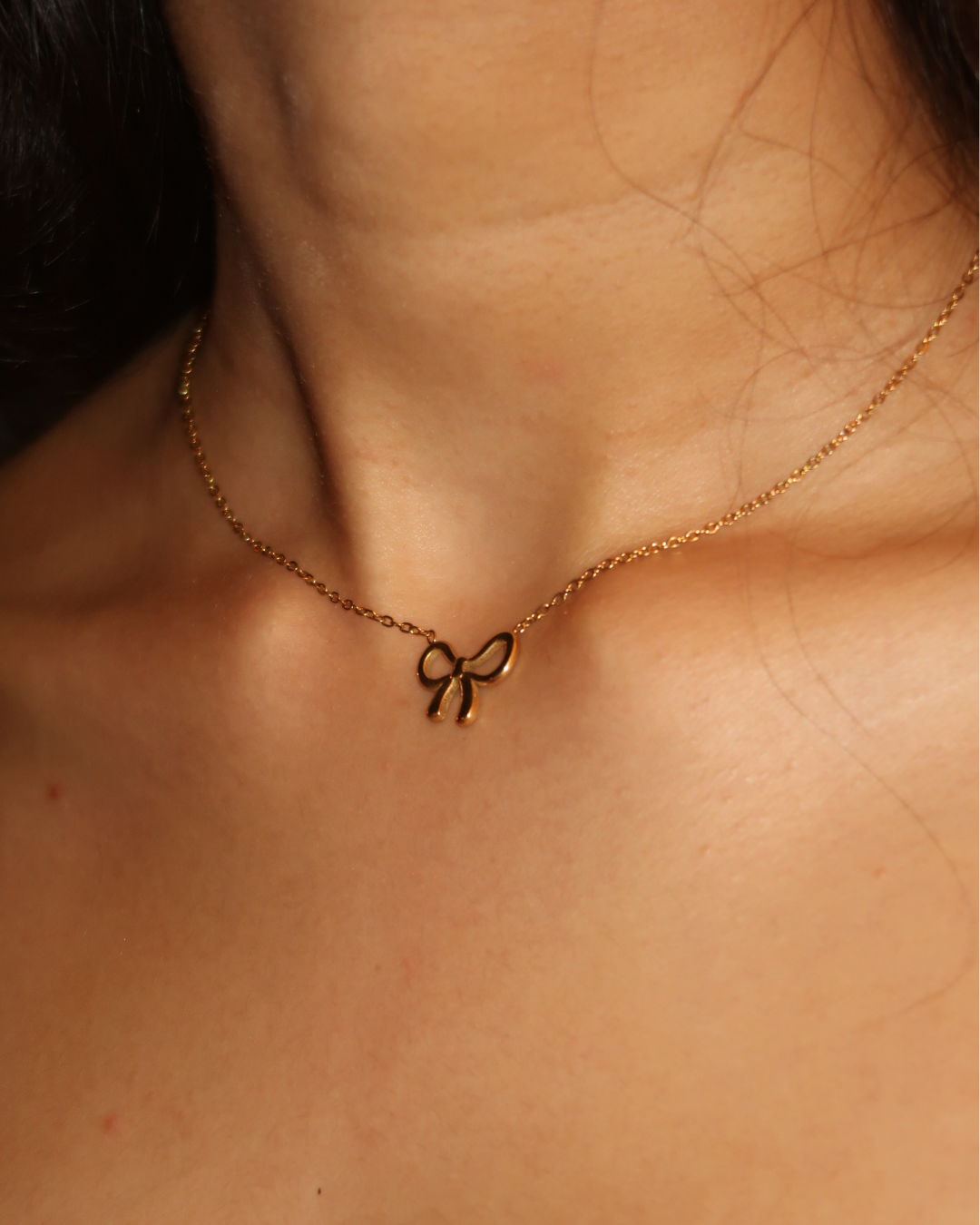 Bow pendant